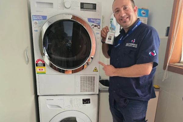 Technician after doing the washing machine and dryer repair in melbourne