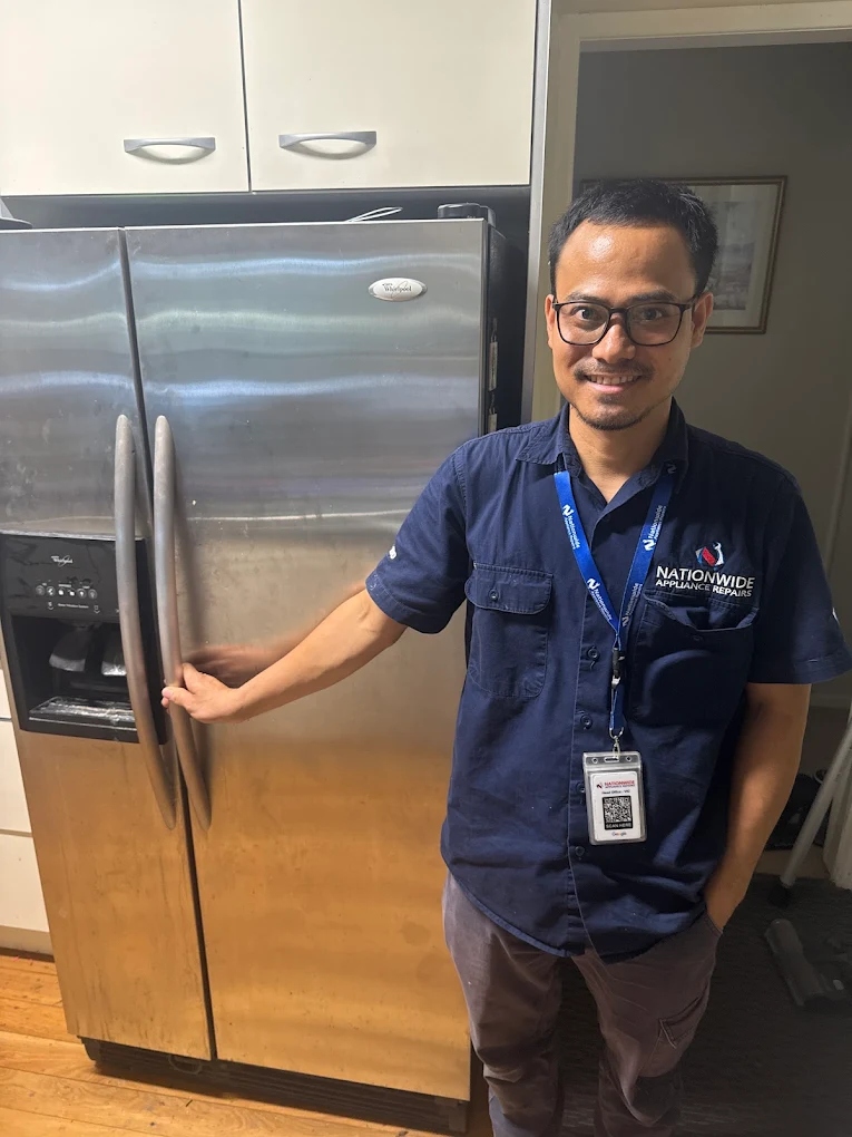 A QAR technician doing Fridge Repairs in Sydney