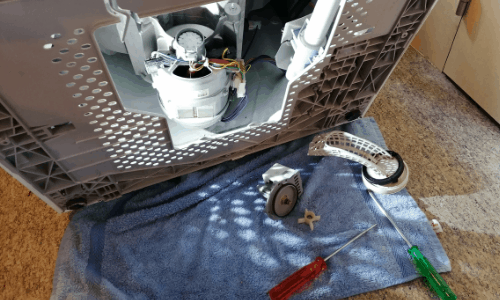 checking out the drain pump of washing machine