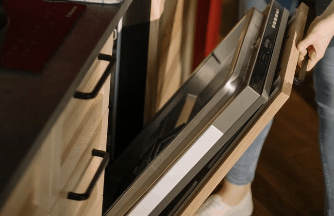 removing the panel of the dishwasher