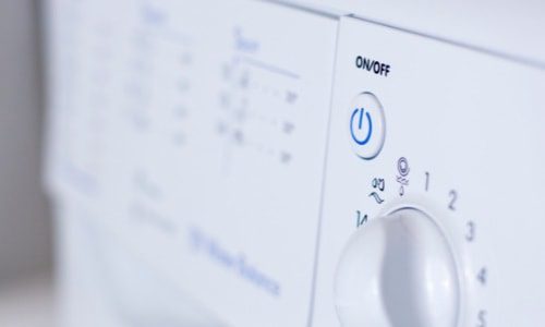 power down the washing machine before draining